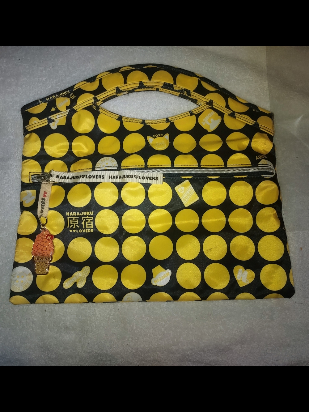 Harajuku Lovers Black Tote with Yellow Polka Dot Pattern and Charm